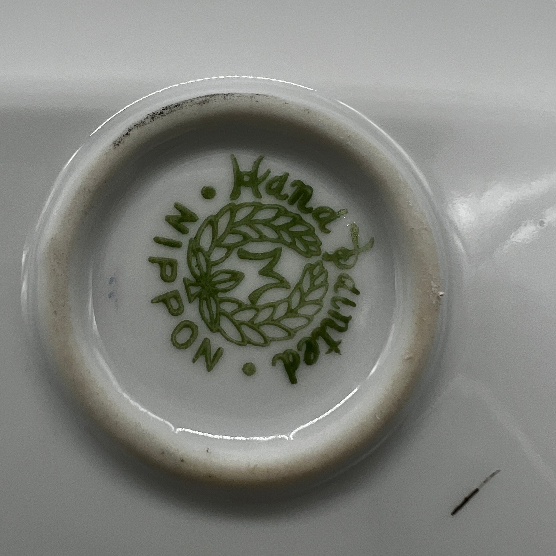 Ceramic product with 'Made in Japan' text on a white background