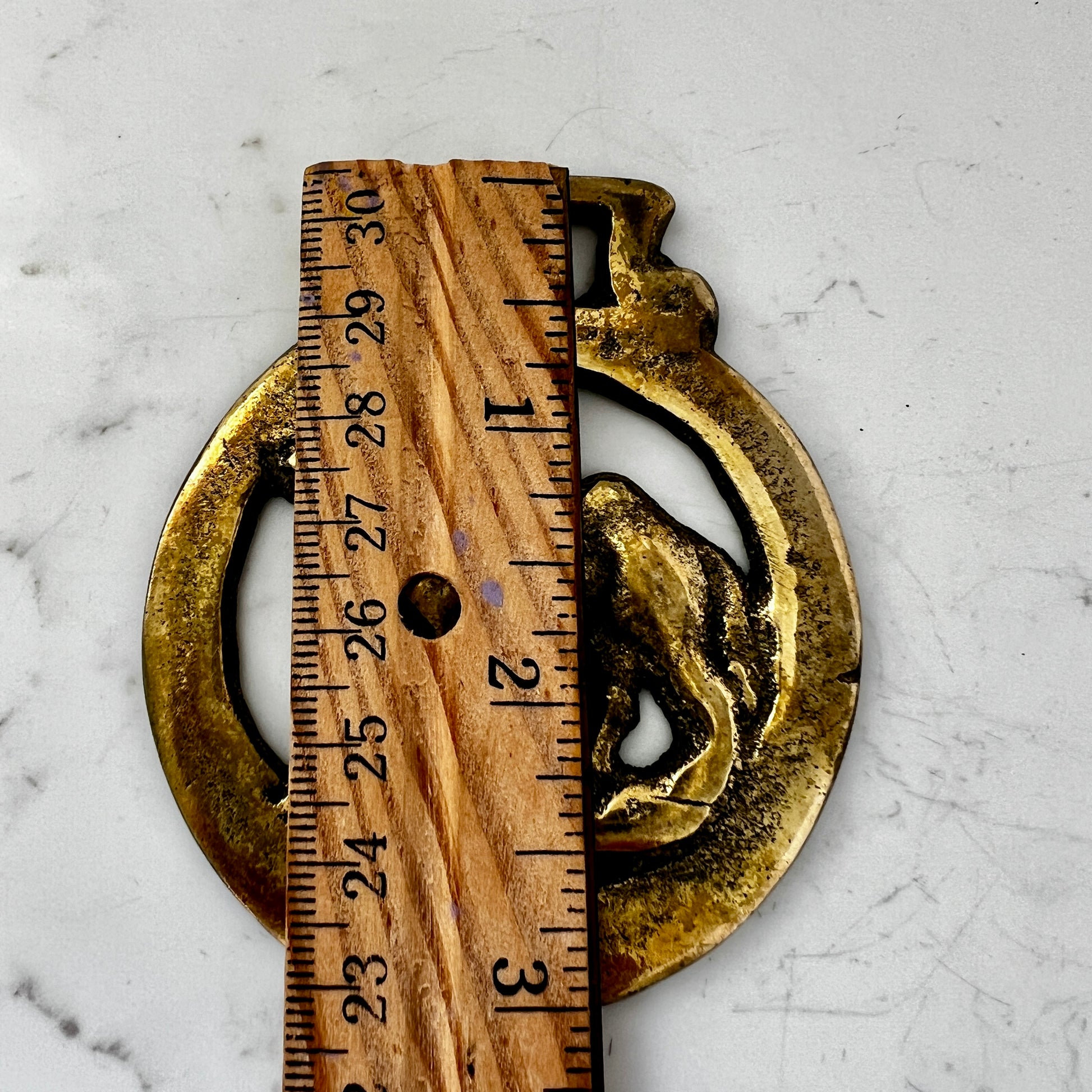 Vintage camel horse brass medallion on double-strand neutral beaded necklace with caramel leather connector.