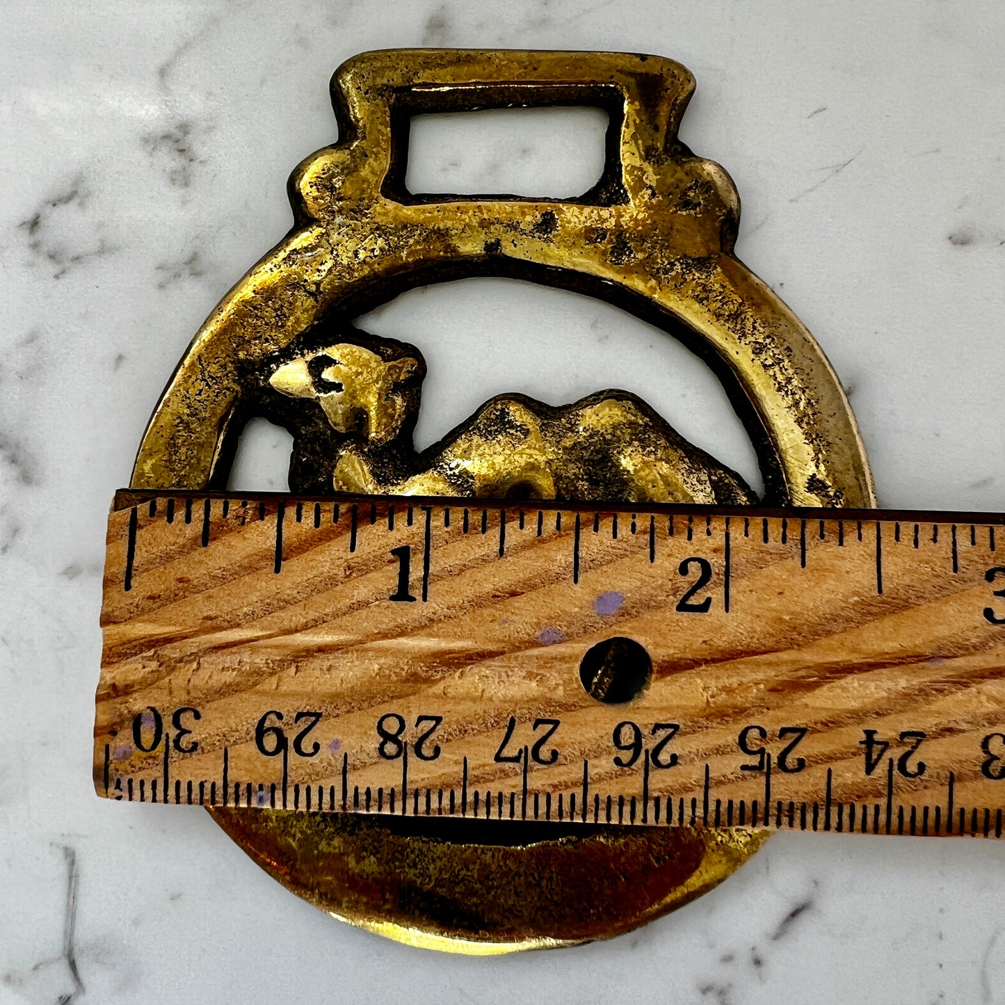 Vintage camel horse brass medallion on double-strand neutral beaded necklace with caramel leather connector.