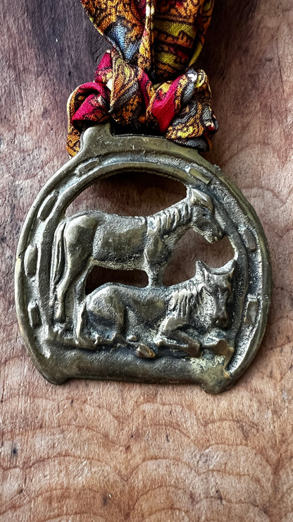 Vintage horse brass medallion necklace with paisley scarf, equestrian boho jewelry.