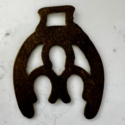 Vintage double horseshoe brass medallion necklace with dark multi-strand beads and leather connector.