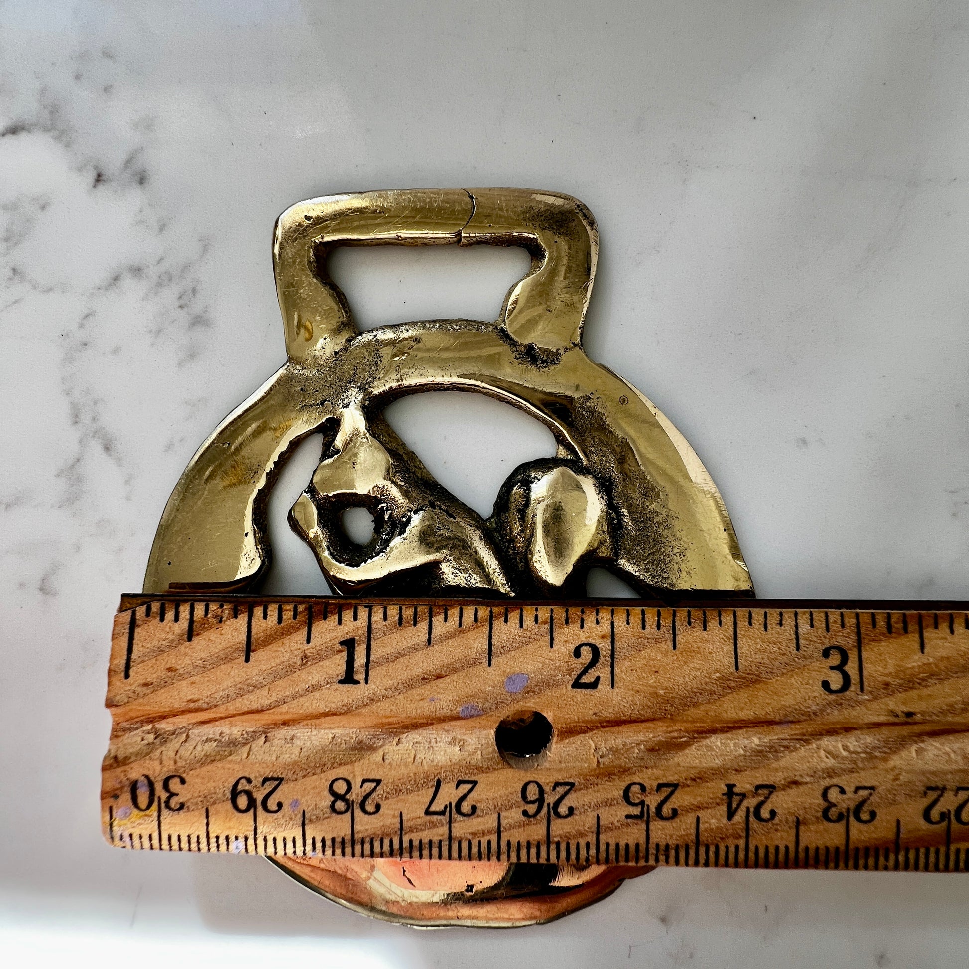 Vintage squirrel brass horse medallion on multi-strand black and silver beaded necklace with leather connector.