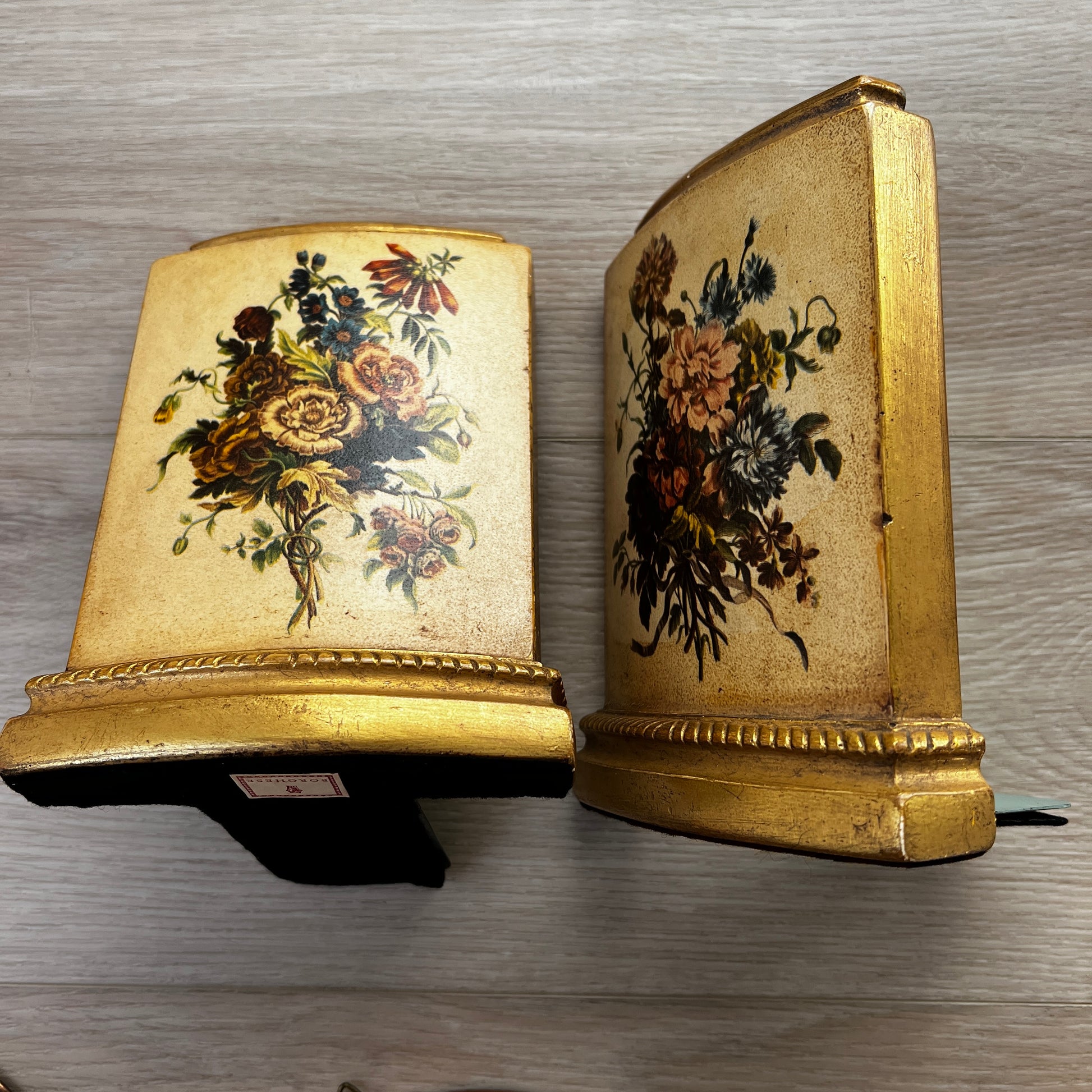 Pair of vintage MCM Borghese floral gold bookends with raised flower design for styled shelves or mid century décor.