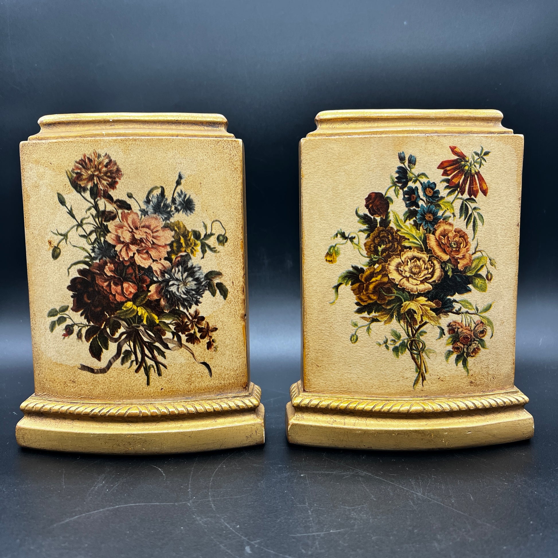 Pair of vintage MCM Borghese floral gold bookends with raised flower design for styled shelves or mid century décor.