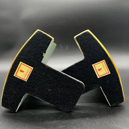 Base and back of vintage Borghese floral bookends showing aged gold finish and vintage wear.