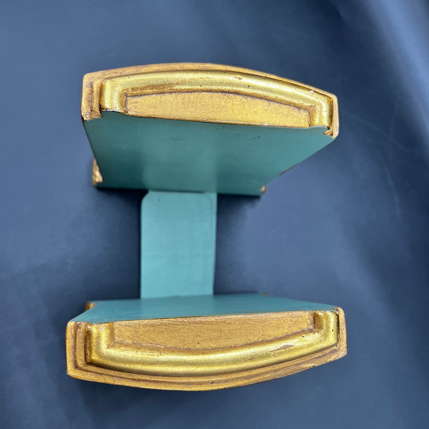 Pair of vintage MCM Borghese floral gold bookends with raised flower design for styled shelves or mid century décor.
