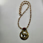 Vintage camel horse brass medallion on double-strand neutral beaded necklace with caramel leather connector.