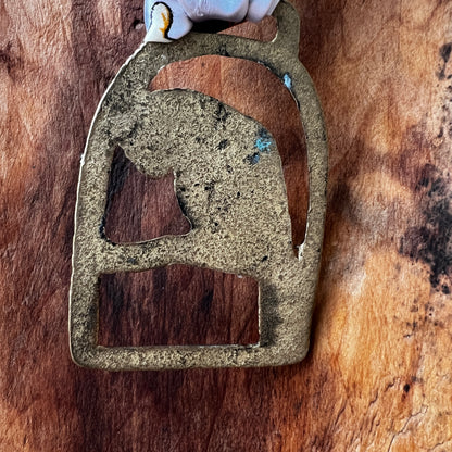 Back of Vintage parrot brass medallion necklace with black and gold scarf, boho eclectic jewelry.