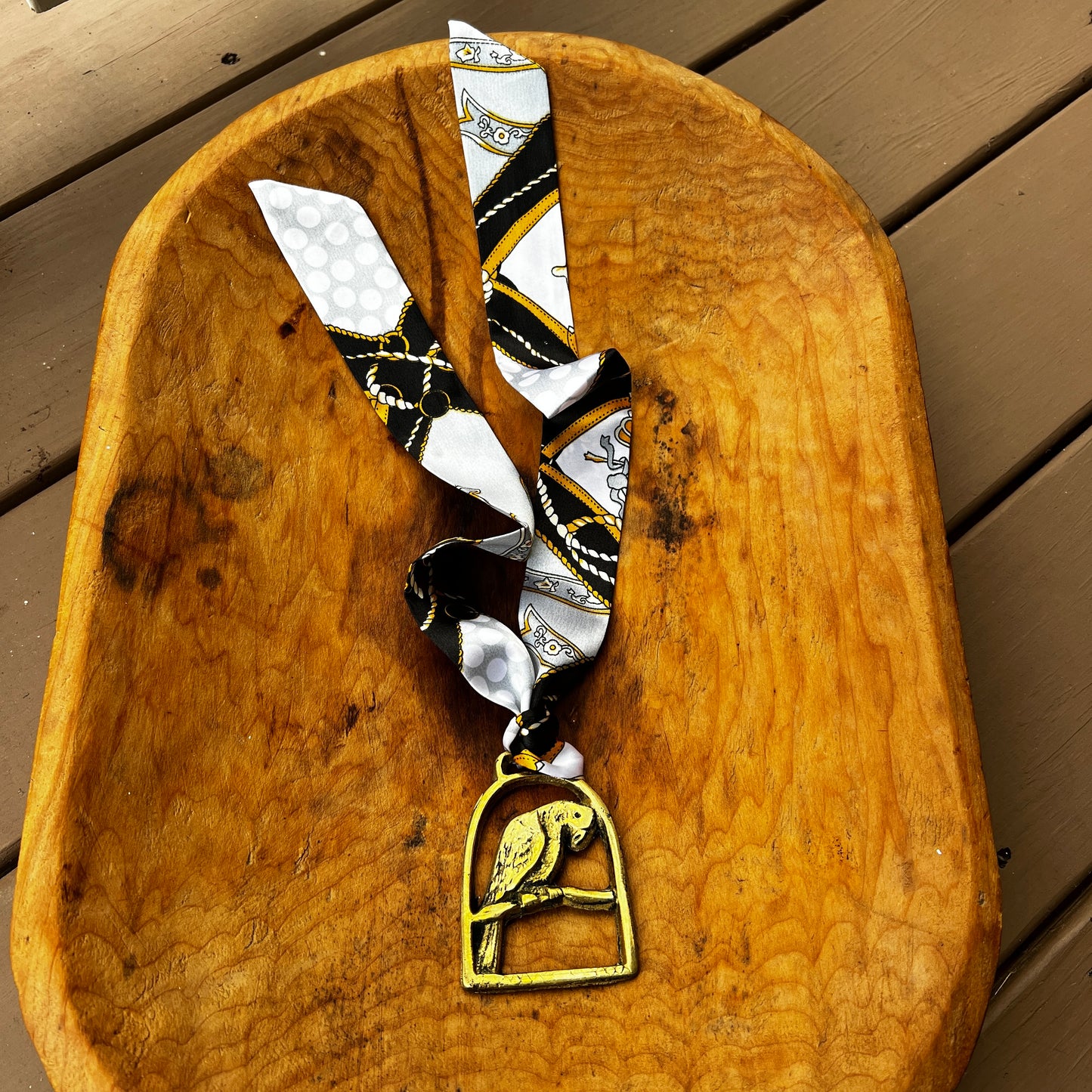 Vintage parrot brass medallion necklace with black and gold scarf, boho eclectic jewelry.