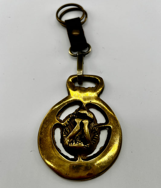 Vintage brass love birds medallion keychain with leather loop and brass key ring.