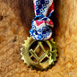 Vintage Masonic square and compass brass medallion necklace with red white blue scarf.