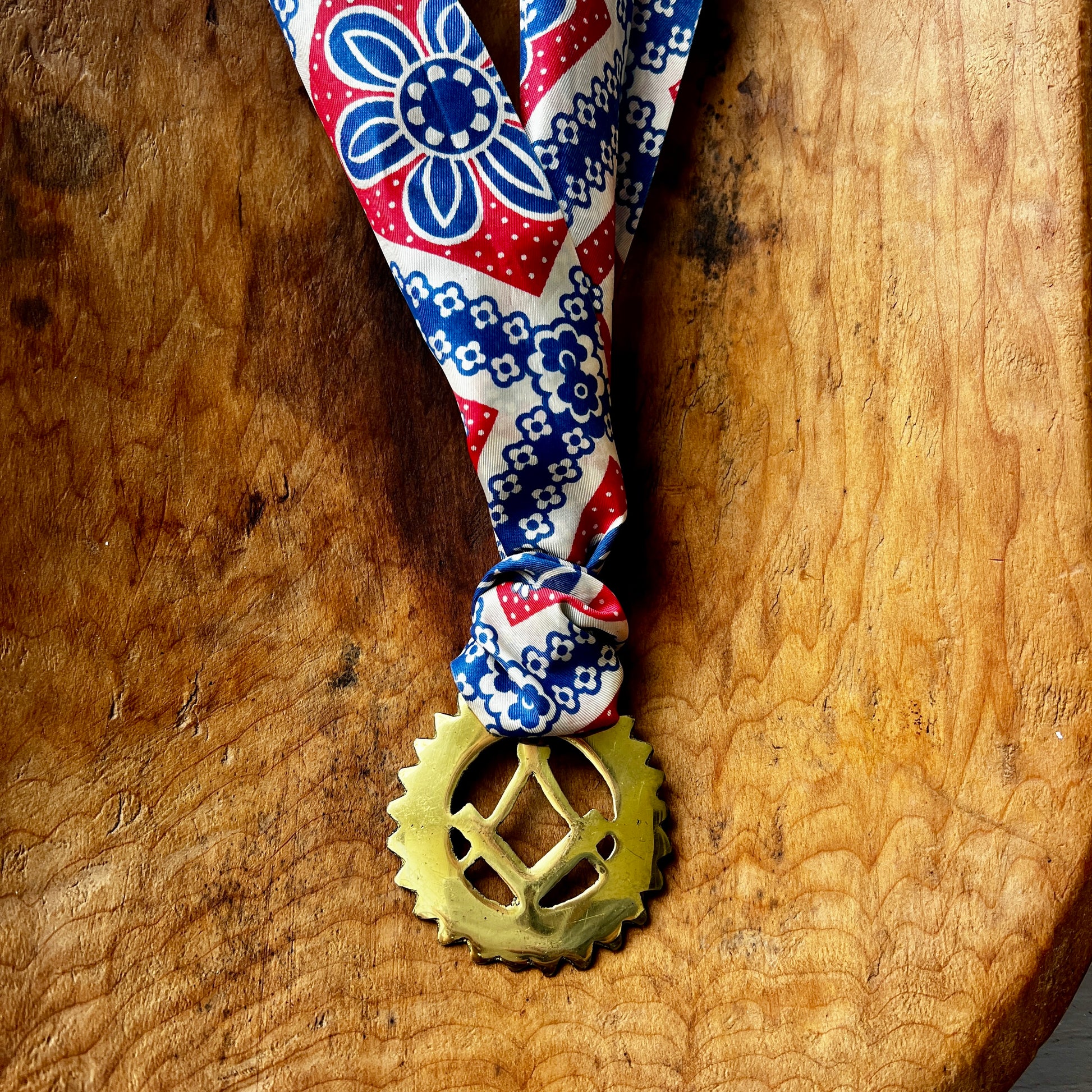 Vintage Masonic square and compass brass medallion necklace with red white blue scarf.