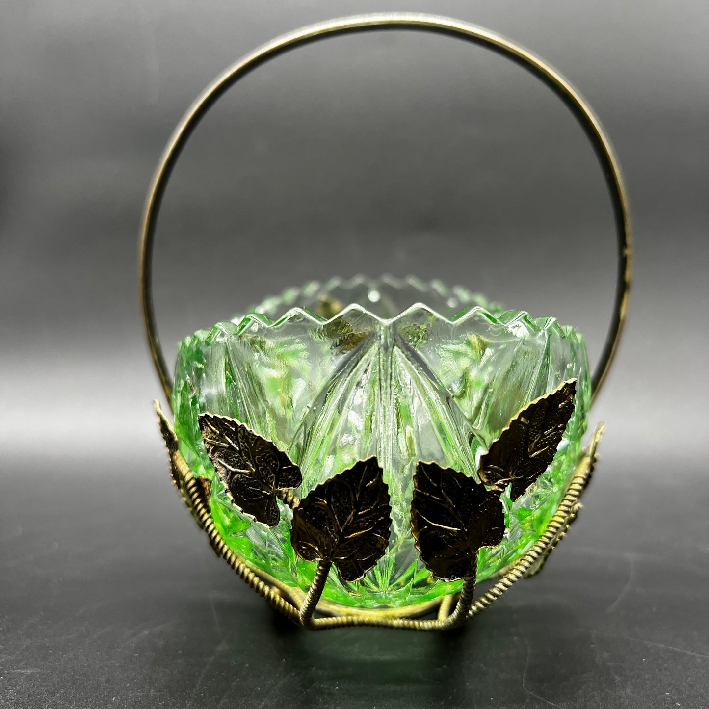 Decorative glass bowl with leaf designs gold tone basket