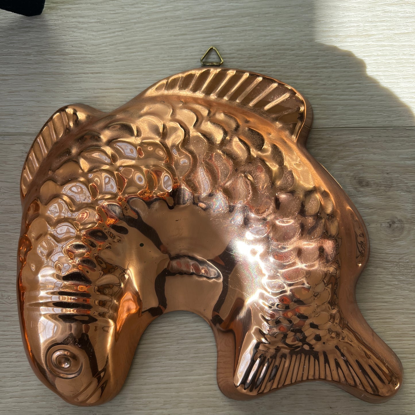 Vintage copper fish mold wall décor with embossed scales and hanging loop, mid century kitchen and coastal home accent