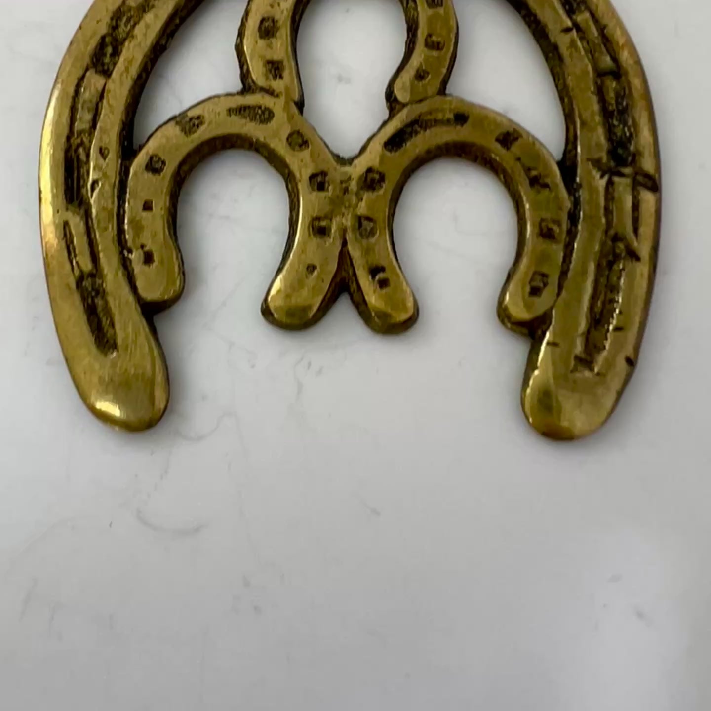 Vintage double horseshoe brass medallion necklace with dark multi-strand beads and leather connector video