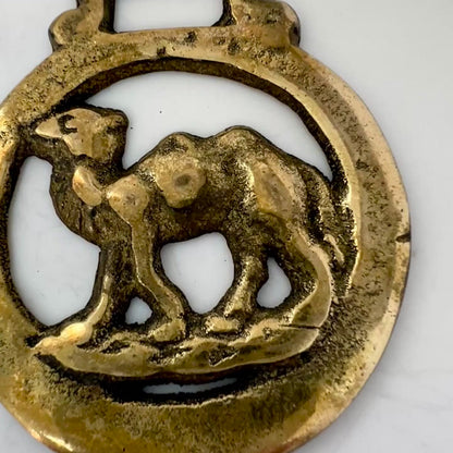 Vintage camel horse brass medallion on double-strand neutral beaded necklace with caramel leather connector.